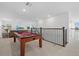 Game room with a pool table and view of the living room at 7765 Grande Shores Dr, Sarasota, FL 34240