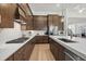 Well-equipped kitchen with an island, modern appliances, and plenty of counter space at 7765 Grande Shores Dr, Sarasota, FL 34240