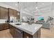 Beautiful kitchen featuring a large island, stainless appliances, and an open layout at 7765 Grande Shores Dr, Sarasota, FL 34240