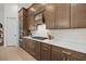 Modern kitchen with ample cabinet space, quartz countertops, and professional-grade appliances at 7765 Grande Shores Dr, Sarasota, FL 34240
