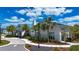 Well-maintained community clubhouse with sidewalks and tropical landscaping at 8232 Reefbay Cv, Parrish, FL 34219