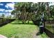 The fenced dog park provides a safe space for pets to play, with waste disposal stations for cleanliness at 8232 Reefbay Cv, Parrish, FL 34219
