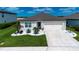 Charming single-Gathering home featuring manicured lawn and a convenient two-car garage at 8232 Reefbay Cv, Parrish, FL 34219
