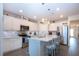 Well-equipped kitchen with center island, modern appliances, and plenty of storage at 8232 Reefbay Cv, Parrish, FL 34219