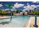 Sparkling community pool with interactive water features, ideal for Gathering fun and leisure at 8232 Reefbay Cv, Parrish, FL 34219