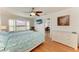Inviting bedroom with scenic views and a ceiling fan at 8977 Midnight Pass Rd # 519, Sarasota, FL 34242