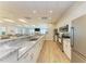 Spacious kitchen with stainless steel appliances and ample counter space perfect for entertaining guests in a modern style at 8977 Midnight Pass Rd # 519, Sarasota, FL 34242