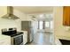 The spacious kitchen is equipped with stainless steel appliances and ample counter space at 1028 36Th E Ave, Ellenton, FL 34222