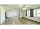 Living room with modern floors, a ceiling fan, and natural light at 1028 36Th E Ave, Ellenton, FL 34222