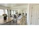 Bright and airy living room with modern floors and a white brick fireplace at 1028 36Th E Ave, Ellenton, FL 34222