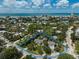 Aerial view of property near the ocean with the property line in blue at 105 Island Cir, Sarasota, FL 34242