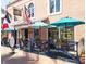 Quaint French cafe with outdoor seating, featuring a menu of breakfast, salads, crepes, and coffee for takeout at 105 Island Cir, Sarasota, FL 34242
