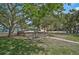 Community park with lush greenery and benches, a peaceful retreat at 105 Island Cir, Sarasota, FL 34242
