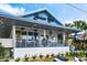 Exterior of Siesta Key Summer House, a steak and seafood restaurant, with patio seating and signage at 105 Island Cir, Sarasota, FL 34242