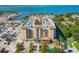 Stunning waterfront building featuring a pool, covered entrance, and easy parking at 1064 N Tamiami Trl # 1133, Sarasota, FL 34236