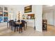Dining area with a view to the kitchen at 1064 N Tamiami Trl # 1133, Sarasota, FL 34236