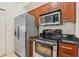Well-equipped kitchen with stainless steel appliances at 1064 N Tamiami Trl # 1133, Sarasota, FL 34236