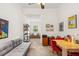 Cozy living room with unique decor and bright natural lighting at 1064 N Tamiami Trl # 1133, Sarasota, FL 34236