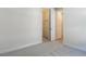 Bedroom featuring a walk-in closet and neutral-colored carpeted flooring at 12570 Brookgreen St, Venice, FL 34293