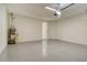 Spacious two-car garage with epoxy flooring and ample storage at 12570 Brookgreen St, Venice, FL 34293