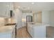 Well-appointed kitchen with quartz countertops, stainless steel appliances, and ample storage at 12570 Brookgreen St, Venice, FL 34293