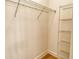 Walk-in closet featuring a wire shelving system and wood floors at 12570 Brookgreen St, Venice, FL 34293