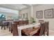 Elegant dining room with a glass table and beautiful decor at 14350 Stirling Dr, Lakewood Ranch, FL 34202