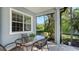 Relaxing screened lanai with garden view and outdoor dining area at 14350 Stirling Dr, Lakewood Ranch, FL 34202