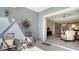 Open patio featuring sun decoration and a view into the cozy living room at 14350 Stirling Dr, Lakewood Ranch, FL 34202