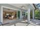 Comfortable covered patio with ceiling fan and outdoor seating area at 14350 Stirling Dr, Lakewood Ranch, FL 34202
