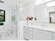Modern bathroom featuring a glass walk-in shower, sleek vanity, and contemporary fixtures at 1493 Landings Lake Dr # 32, Sarasota, FL 34231