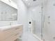 Modern bathroom featuring a walk-in glass shower, sleek vanity, and contemporary fixtures at 1493 Landings Lake Dr # 32, Sarasota, FL 34231