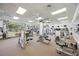 Well-equipped fitness center with modern machines, large windows, and ample workout space at 1586 Dorgali Dr, Sarasota, FL 34238