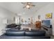 Comfortable living room featuring an open concept with a stylish furniture arrangement at 18106 Canal Pointe St, Tampa, FL 33647