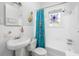 Bathroom featuring a flamingo shower curtain and stained glass window at 1871 Prospect St, Sarasota, FL 34239