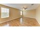 Spacious bedroom featuring a ceiling fan and lots of light streaming through the window at 1912 Hawks View Dr, Ruskin, FL 33570
