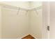Walk-in closet offers ample storage space with wire shelving and a light interior at 1912 Hawks View Dr, Ruskin, FL 33570
