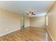 Open-concept living room with a ceiling fan and an entry to a closet at 1912 Hawks View Dr, Ruskin, FL 33570