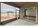 Screened-in patio overlooking a backyard featuring pergola, fire pit, and landscaping at 1912 Hawks View Dr, Ruskin, FL 33570