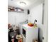 Practical laundry room with washer, dryer, and storage solutions for efficient organization at 2035 Vinson Ave, Sarasota, FL 34232