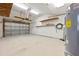 Spacious garage with shelving, water heater, storage, and a bright interior at 204 75Th St, Holmes Beach, FL 34217