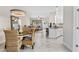Open-concept layout connects dining, living, and kitchen areas, perfect for entertaining and Gathering gatherings at 2193 Bonito Way, Port Charlotte, FL 33953