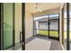 Covered patio offering a private outdoor space, perfect for relaxing or entertaining with screened enclosure at 2193 Bonito Way, Port Charlotte, FL 33953