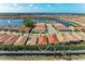 Aerial view of a lakeside community showcasing beautiful homes and serene water views at 224 Soliera St, Nokomis, FL 34275