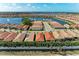 Aerial view of a beautiful lakeside community with a serene lake at 224 Soliera St, Nokomis, FL 34275