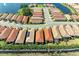 A tranquil aerial view of homes in a lakeside community near a serene lake at 224 Soliera St, Nokomis, FL 34275