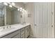 Bathroom featuring dual sinks, a vanity and a separate shower area at 224 Soliera St, Nokomis, FL 34275