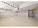 Spacious basement with concrete floor and neutral colored walls at 2551 Waneta Dr, Sarasota, FL 34231