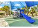 Fun playground featuring a slide, climbing structure, sun shade and other recreational features at 2551 Waneta Dr, Sarasota, FL 34231