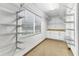 Pantry features shelving, cabinetry, counter space, and a window at 3072 Meyer Dr, Sarasota, FL 34239